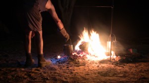 Andy Andy tends the fire